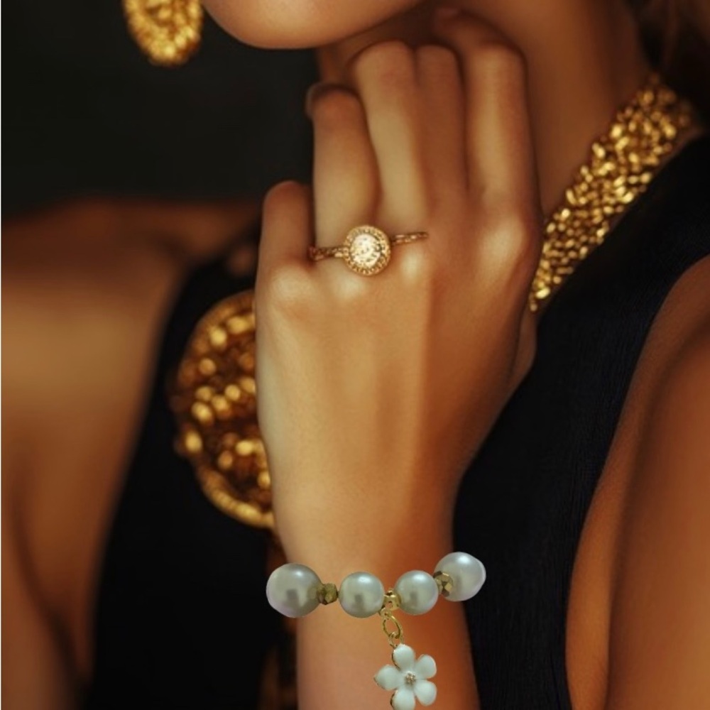 Elegant Gold and Pearl Bracelet with Floral  Charm